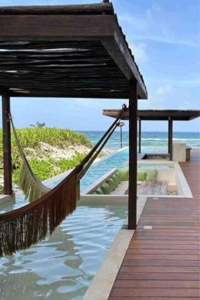Jungle retreat with 2 pools & private beach access